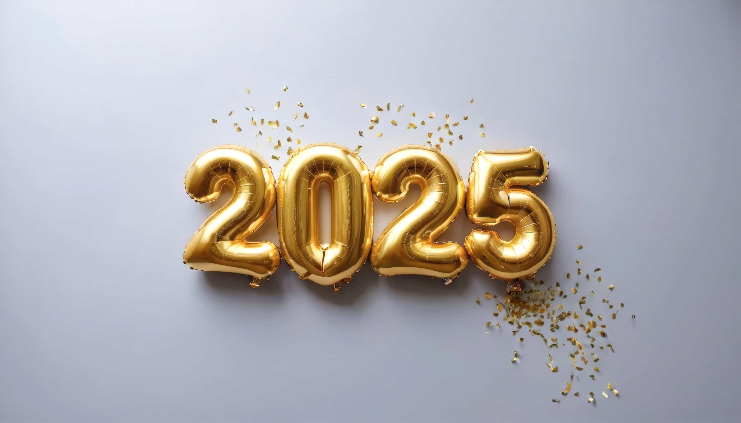 Gold balloons spelling out 2025